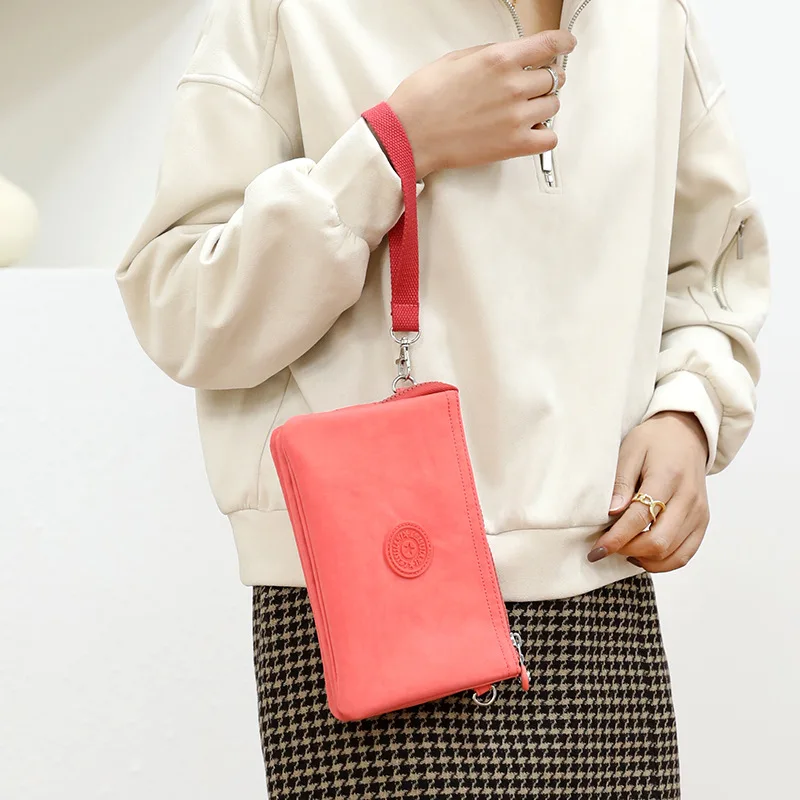 Didmeninė 2023 naujas moterų sankabos krepšys atsitiktinis nailono audinio monetos rankinėje multi-layer nešiojamas mobiliojo telefono krepšys